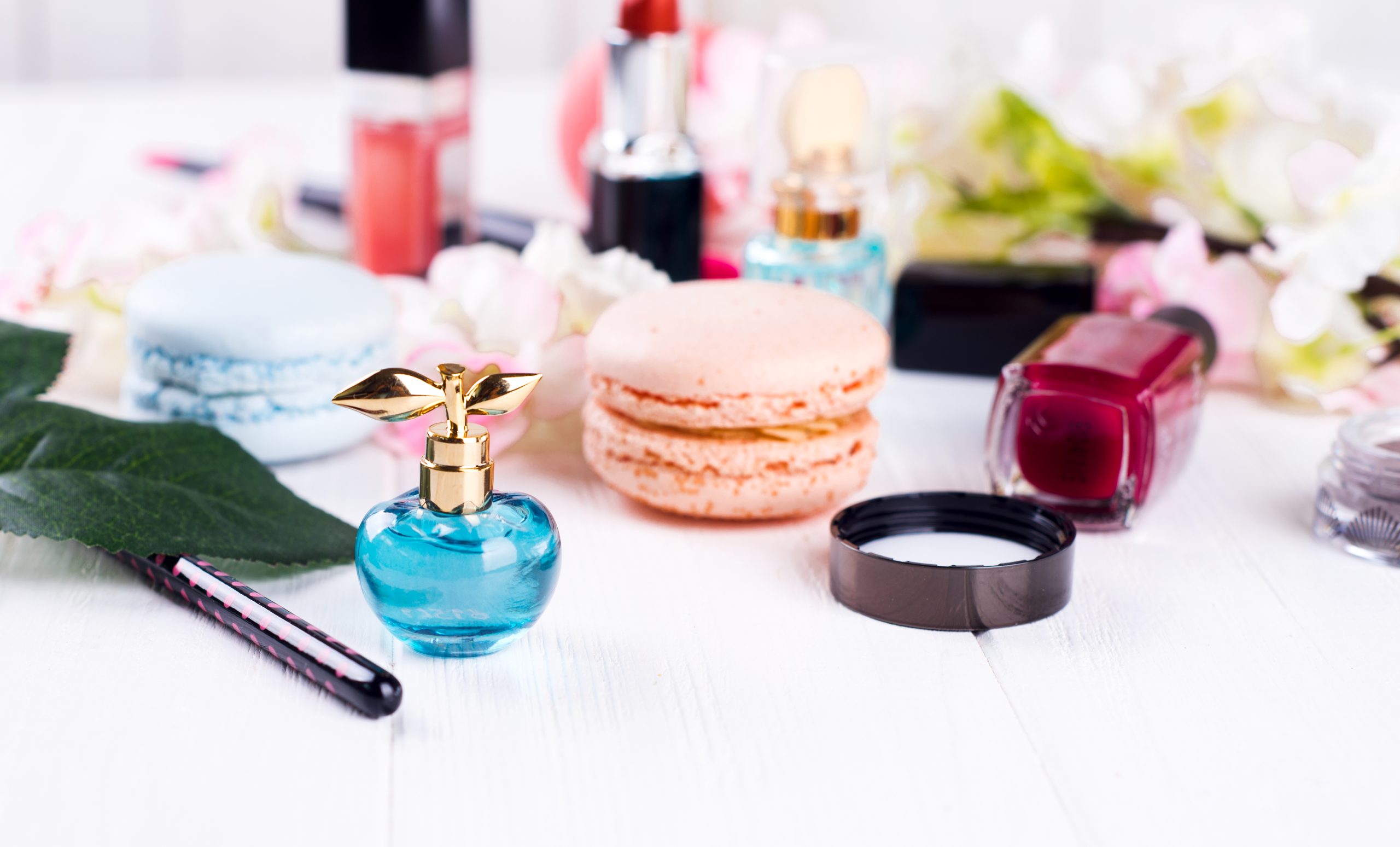 Decorative cosmetics and perfume. Isolated on white